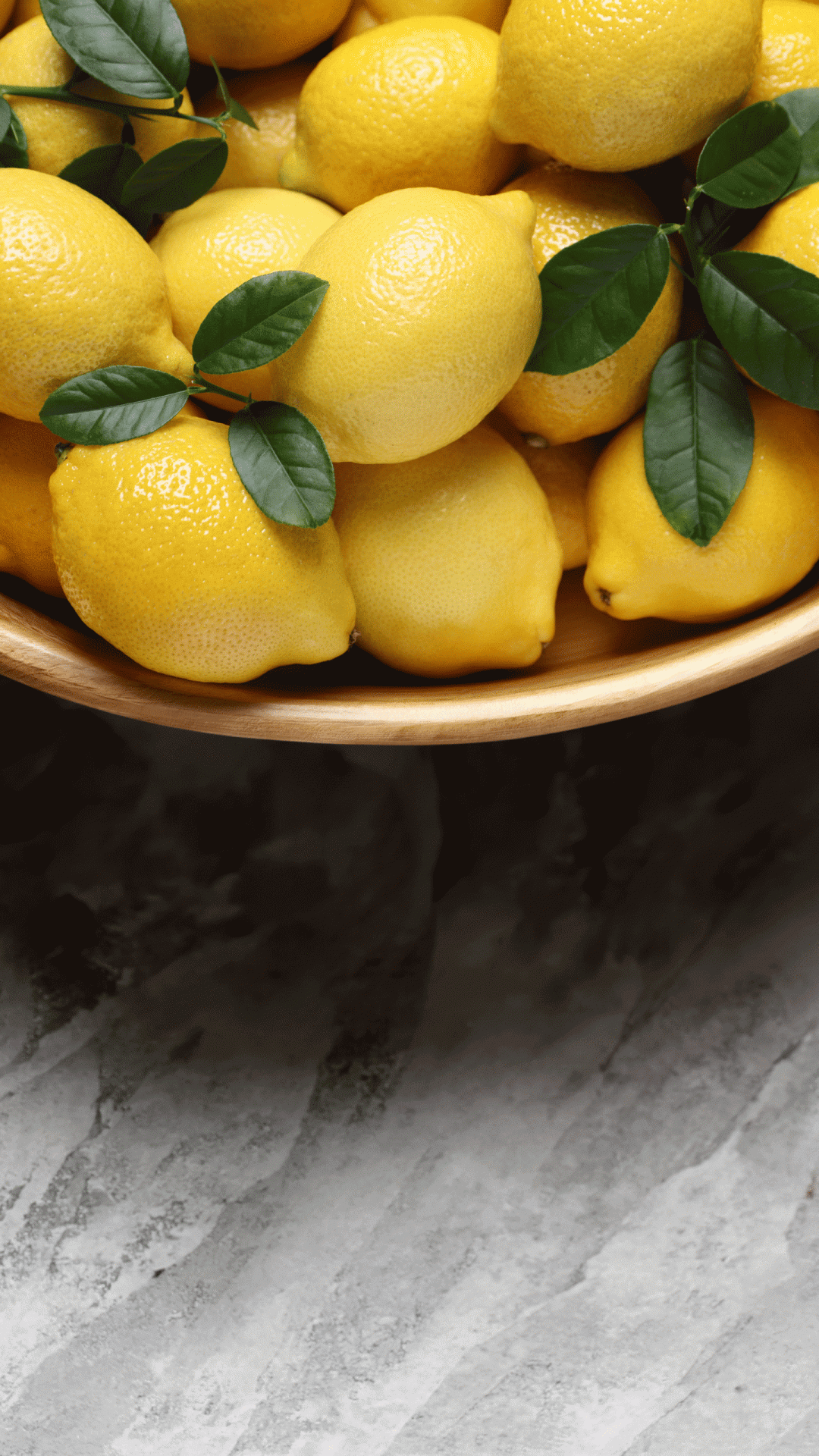 fresh-lemons-and-green-leaves-as-background-top-v-2026-06-16-06-30-12-utc